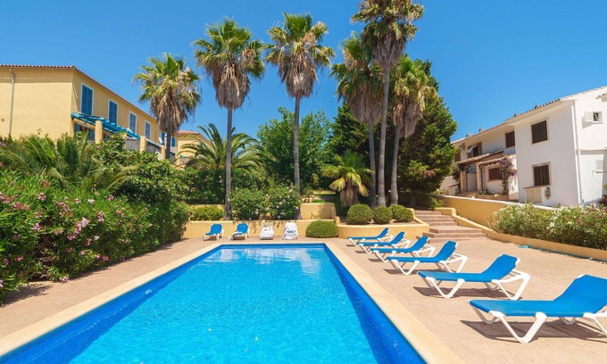 Cala Mandia Apartment | Lovely apartment for 4 people with A/C, pool, WIFI, TV and patio