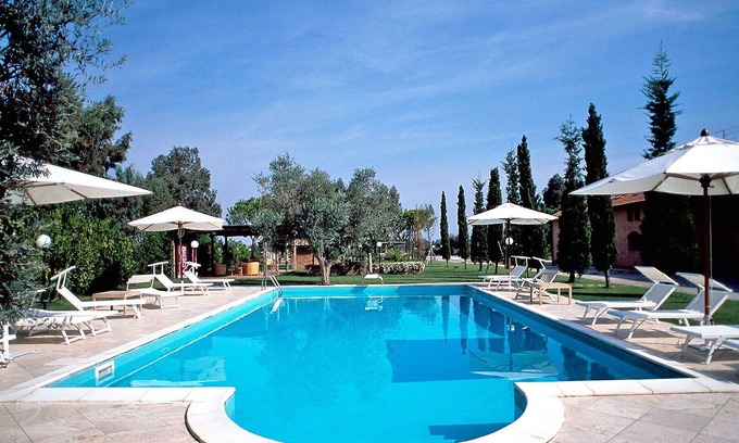 Grosseto Apartment | Lovely apartment for 4 guests with pool, WIFI, A/C, TV, patio, pets allowed and parking