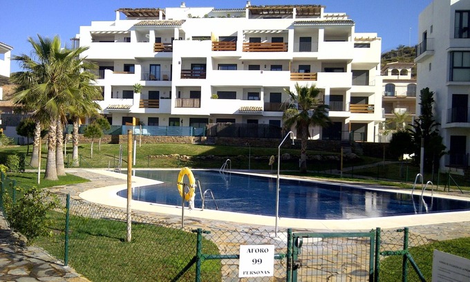 La Cala de Mijas Apartment | Lovely apartment in Alamar with pool, balcony & wi-fi. Short walk to the beach.