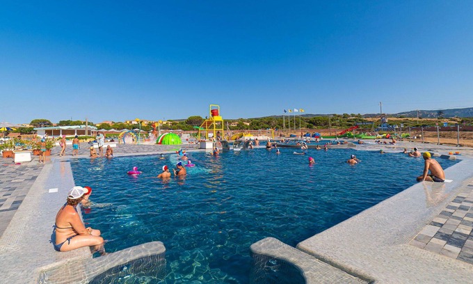 Aglientu House | Lovely apartment in villa for 4 people with WIFI, A/C, pool, TV, patio, pets allowed and parking