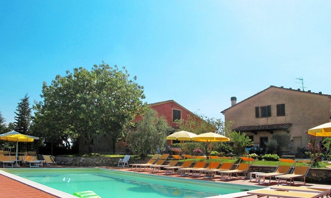 Lajatico Villa | Lovely apartment in villa for 2 guests with WIFI, pool, TV, patio and parking