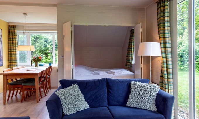 Municipality of Dalfsen House | Lovely apartment in villa for 6 guests with WIFI, pool, TV, terrace and parking