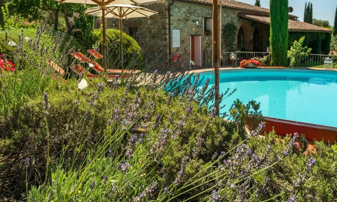 Campagnatico Villa | Lovely apartment in villa with pool, A/C, WIFI, patio, pets allowed, panoramic view and parking