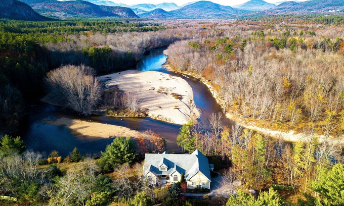 North Conway House | Lovely home with water view, hot tub, fireplace, & washer/dryer