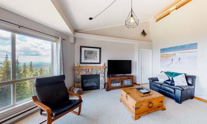 Big White Ski Resort Condo | Lovely mountain-view home with ski/in-ski out access, hot tub, and fireplace