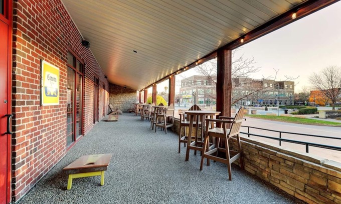 Moline Hotel | Lovely Riverfront Patio Stay! Wild Theme Suites & Pool Fun | 4 Units