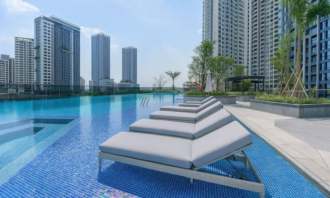 District 9 Apartment | Lumière Riverside by Urban Home