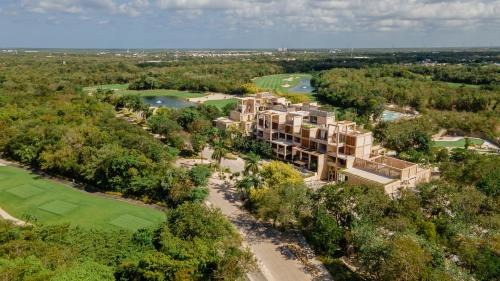 Villa Juarez Apartment | Lumina at The Village Luxury Residences in Corasol