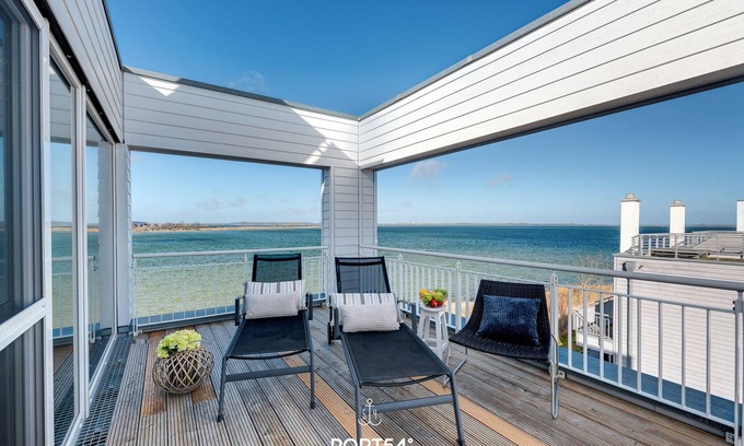Olpenitz House | Lütthoorn - 1st row on the water, wood-burning stove, sauna, roof terrace, barbecue