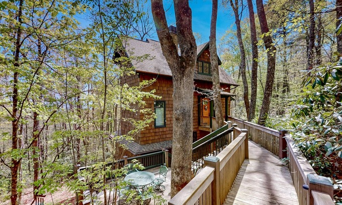 Highlands House | Luxe home overlooking Blue Valley & a stream with elevator & designer interior