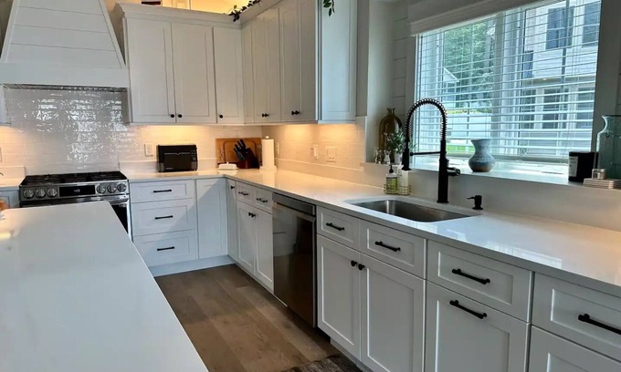 Laconia House | Luxe waterfront on Paugus Bay w/PVT Dock, Fireplace, Pvt Deck, Sonos, Sleeps 10