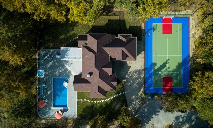Grand Beach House | Luxurious 5 bedroom home steps away from Lake Michigan