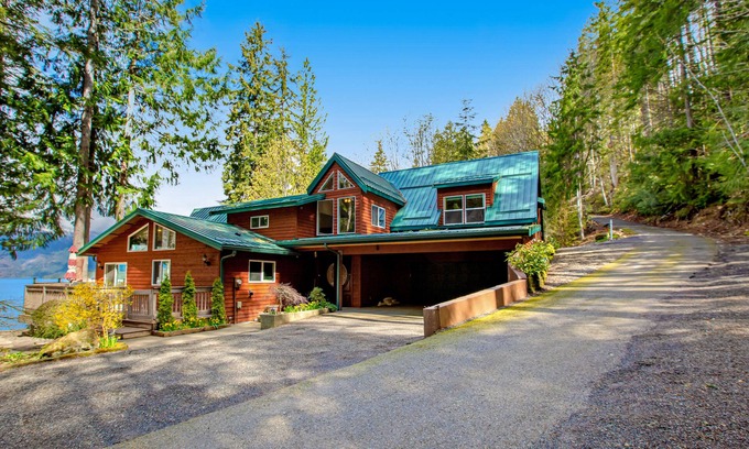 Hoodsport House | Luxurious lakefront home with matchless mountain view & private hot tub- dogs OK
