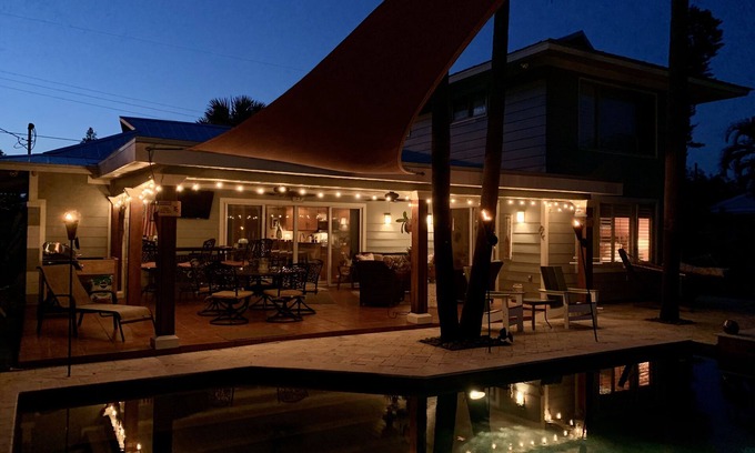 Whitney Beach House | Luxurious waterfront home with pool & spa…serene beach 5 min stroll away.