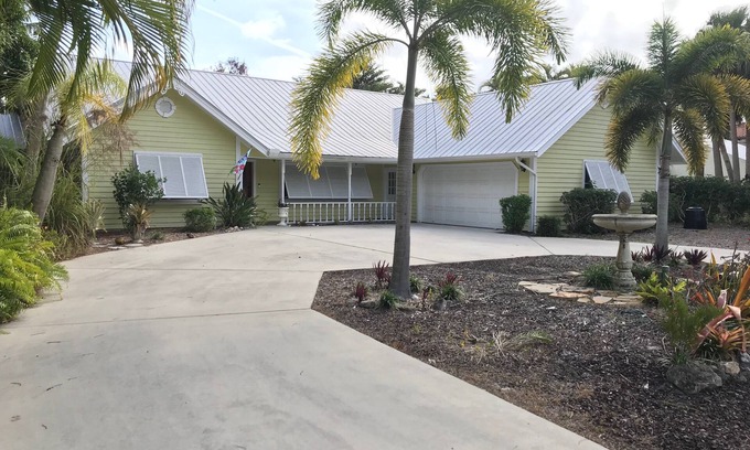 Palm City House | Luxurious Waterfront Home, ocean access, dock, pool, and spa