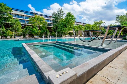 Playacar House | Luxury 2 Bedroom Condo - Infinity Pool at AWA Residences in Playacar, AWA 107