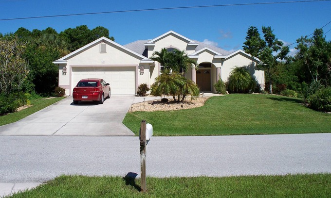 Long Meadow Villa | Luxury 3 bedroom 2 with heated pool and canal view