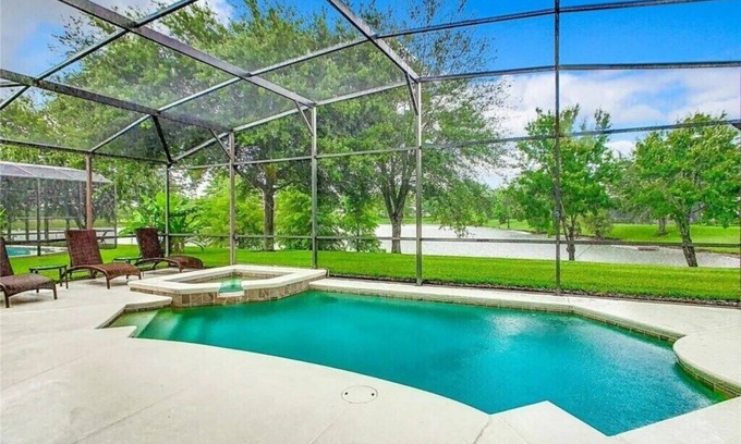 Calabria House | Luxury 5BR Waterfront Retreat w/Pool, Hot Tub & Game Room Near Disney