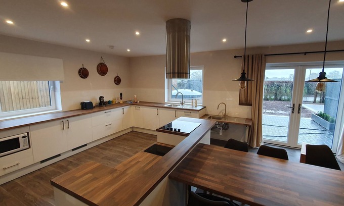 Banwell House | Luxury accessible holiday accommodation with a hot tub and hoists.