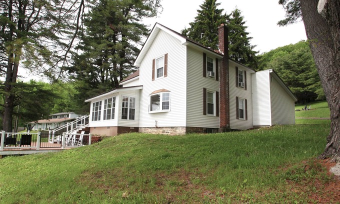 Cooperstown - Otsego Lake House | Luxury accommodation overlooking Lake Otsego with private waterfront. 11 rooms.