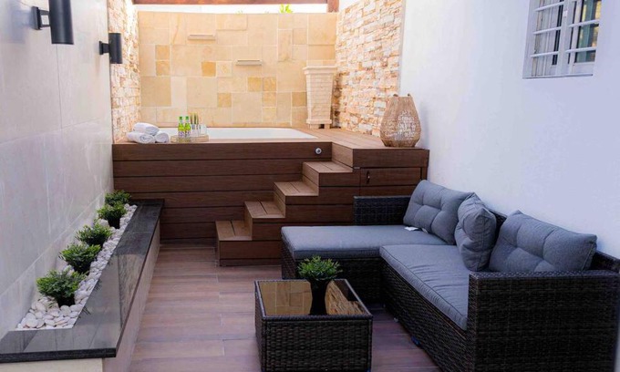 Santiago de los Caballeros Apartment | Luxury stay with terrace and private jacuzzi.
