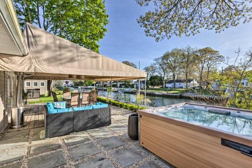 East Quogue House | Luxury Hamptons Home on Canal with Dock and Kayaks!