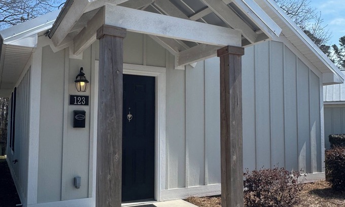 Elizabethtown Resort | Luxury Lodging, Lakefront View, King Bed w/Private Bath, Private Patio.