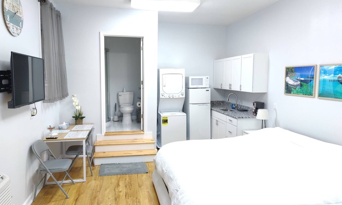Myrtle Beach Apartment | Luxury Master Suite king size bed full bathroom in the center of Myrtle BeachSC