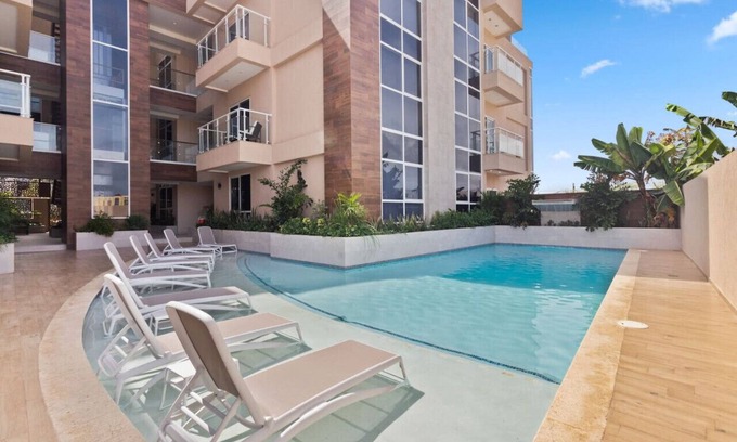 Opal Apartment | Luxury Palm Beach 2BR Condo w/Balcony at Aracari 18 by Bocobay