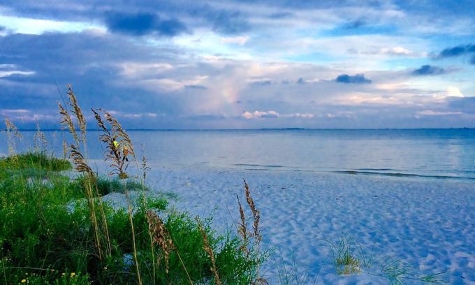 Carrabelle Condo | Luxury WATERFRONT condo overlooking pool, 5 mins to Dog Island, FREE boat slip.