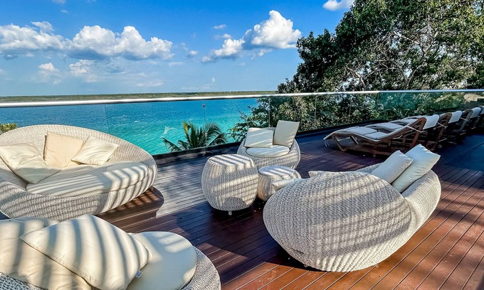 Mario Villanueva Madrid Villa | Luxury waterfront villa with dock, pool, hot tub, outdoor areas, & billiards