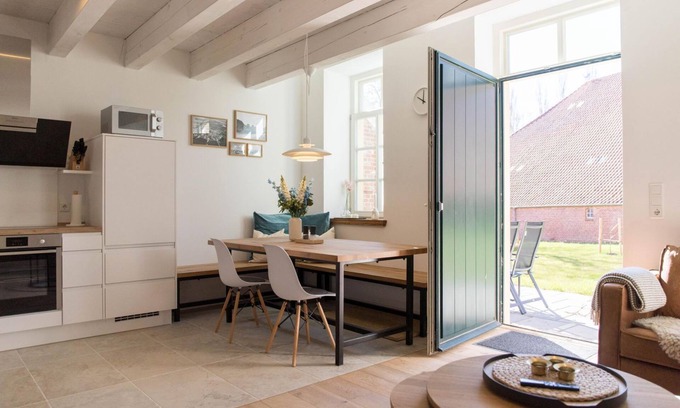 Rysum Apartment | "Maartje" Cozy & modern with sun terrace in Rysum - Van Senden