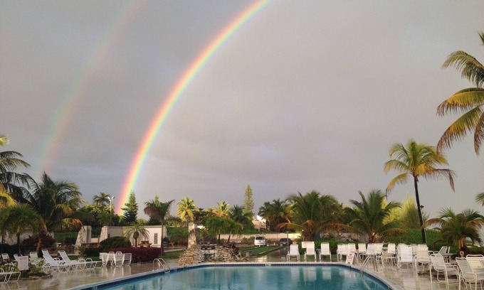 Williams Town Condo | Magnificent beach front condo with pool and restaurant/bar
