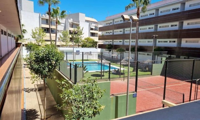 Nuevo Portil Apartment | Magnificent apartment with a spectacular terrace 5 minutes from the beach.