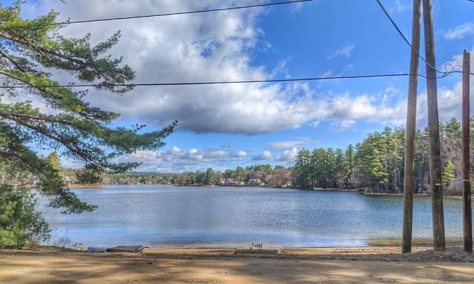 Lochmere House | Makin' Waves on Silver Lake with sandy beach and dock