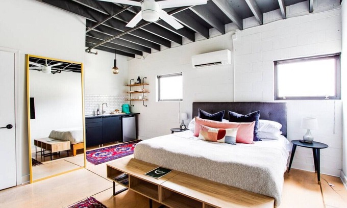 East Market District Apartment | Market #6 · Stellar Suites | Ruby King Suite in NuLu | Bikes