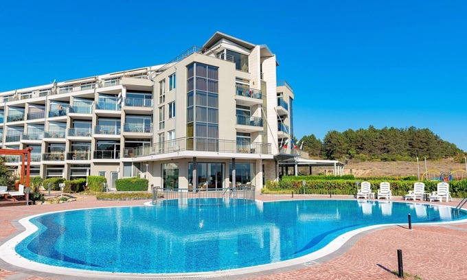 Dyuni Apartment | MENADA * SOUTH PEARL * Family studio with pool and sea view