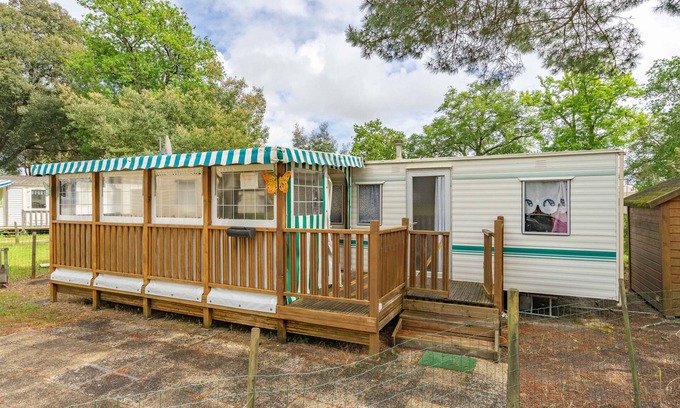 La Tremblade RV Rental | Mobile Home 'Mobilhome Mh343' with Shared Pool, Private Terrace and Private Garden