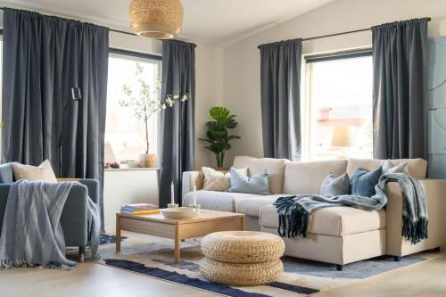 Bastad House | Modern Beachy Home with Terrace Charm First Floor