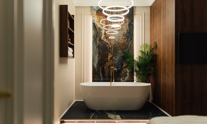 Baia Mare Apartment | Modern&central apartment with a gorgeous bathtub inside one of the two bedrooms.