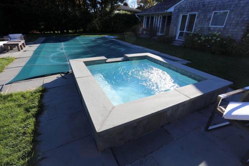 East Hampton North House | Modern Comfy Retreat Patio Outdoor Salt Hot Tub