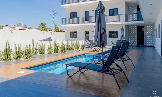 La Paz Condo | Modern Condo, Pools, Private BBQ, Malecon 4 Blocks