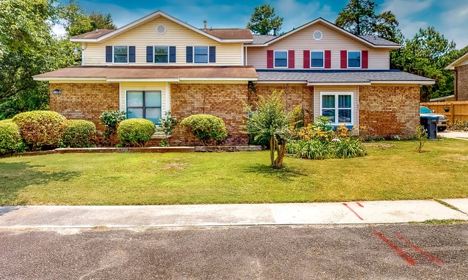 Gracewood House | Modern home with a game room, washer/dryer, AC, covered patio, & large yard