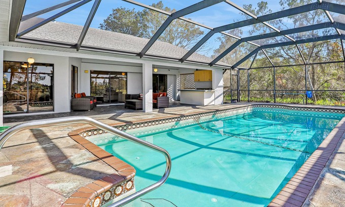 Spring Hill House | Modern home with enclosed private pool on 7th tee of Oak Hills Golf Club