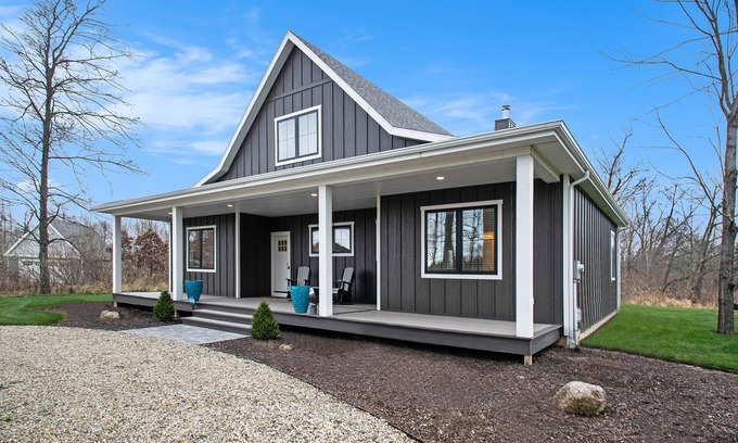 Sawyer House | Modern home with large sun-room, firepit, grill, washer/dryer, & central AC
