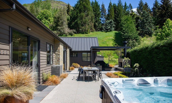 Lower Shotover House | Modern luxury with spa pool, outdoor fireplace, table tennis and darts