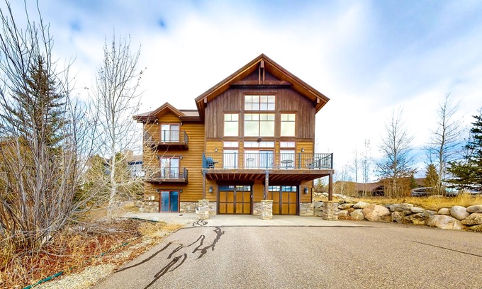 Grand Elk Ranch House | Modern mountain view home with balconies, Ping-Pong table, grill, & fireplace