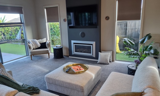 Wharewaka House | Modern, newly furnished house, with own putting green.