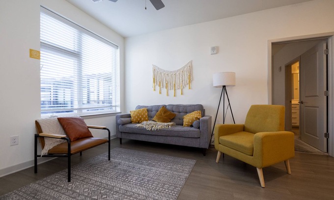 Downtown Louisville Apartment | Modern Nulu 2BR CozySuites 01