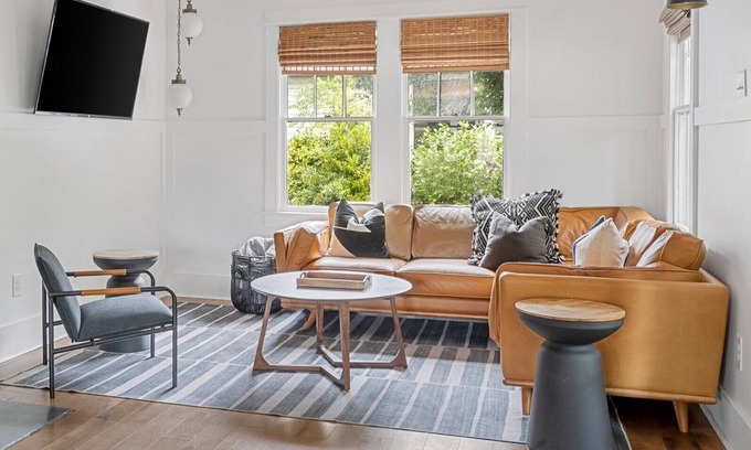 North Charleston House | Modern Park Circle Craftsman Cottage with Putting Green & Pool Table